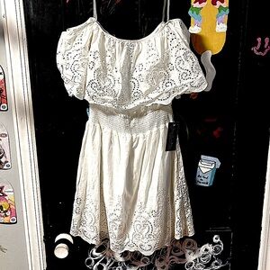 White dress, with tags still on.